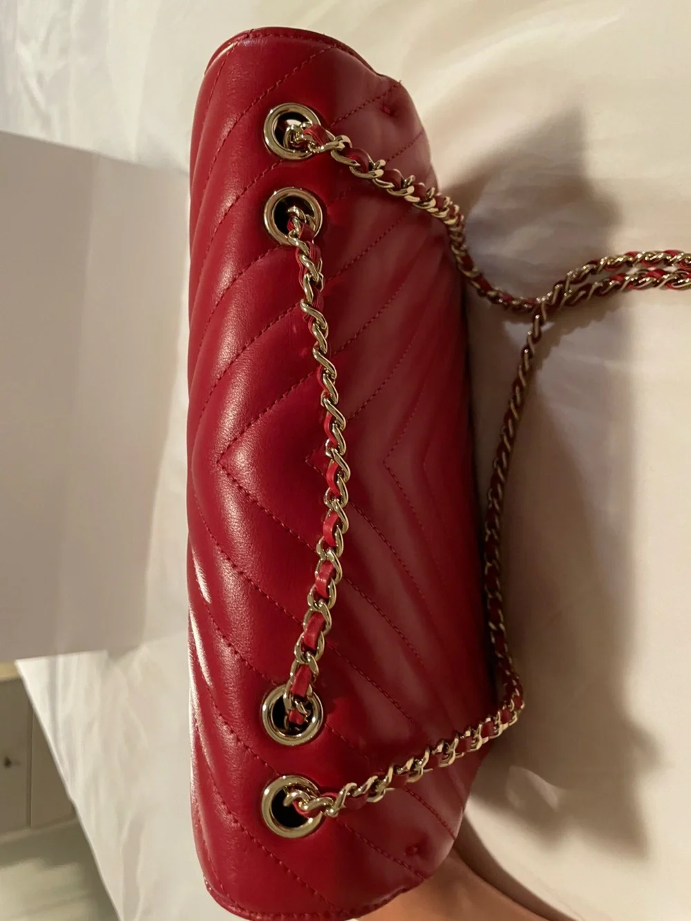 CHANEL Red Quilted Chevron Shoulder Bag with Gold CC Lock